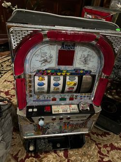 Two big slot machines both work great 160 each come with coins