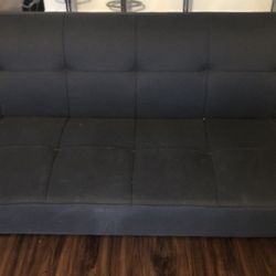 Black comfortable couch- Turns Into Bed