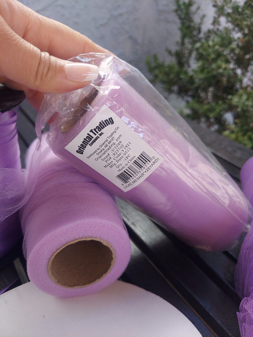 Rolls Of Purple Ribbon And Tulle