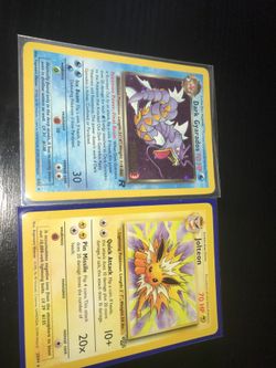 Dark gyarados and jolteon Pokémon cars