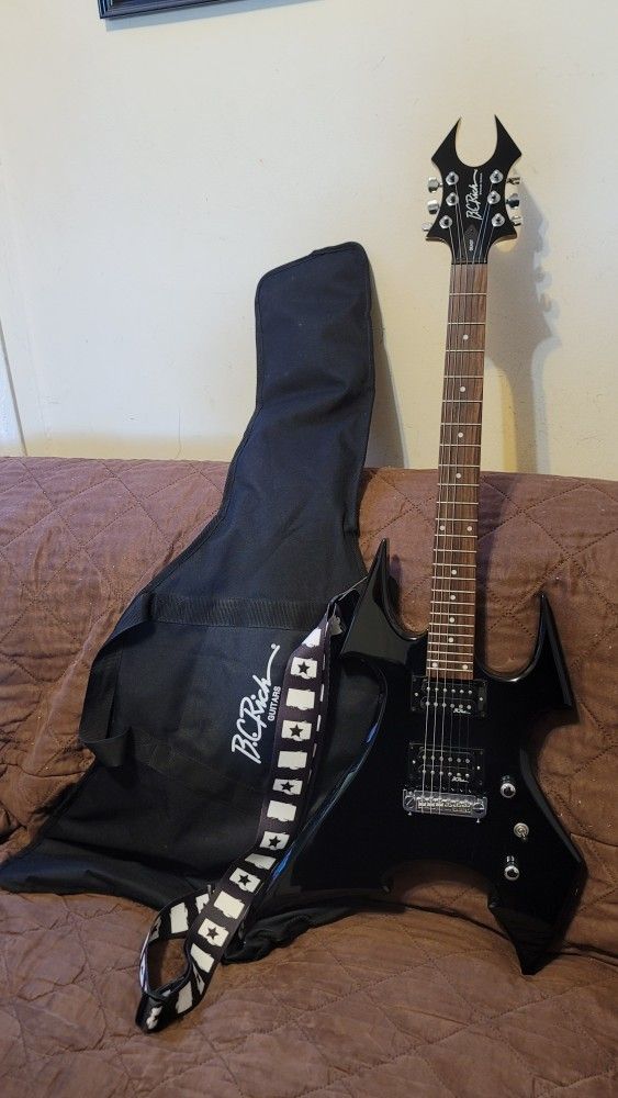 BC RICH BEAST BLACK ONYX SOLID BODY ELECTRIC GUITAR MADE IN KOREA IN BLACK COLOR. 