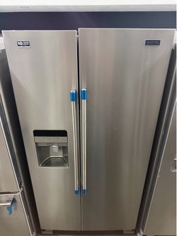 Maytag Side by side refrigerator with ice and water