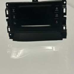 2015 Chrysler 200. Stereo radio and trim bezel trim vent.