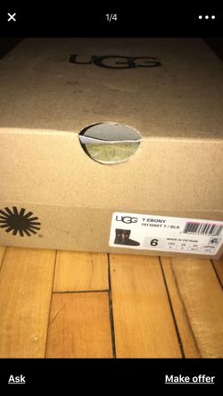 Baby girls’ Black Uggs (lined with fur)