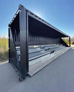 40ft HIGH CUBE SHIPPING CONTAINER REPURPOSED AS MODULAR OUTDOOR BLEACHER SEATING WITH INTEGRATED SHADE