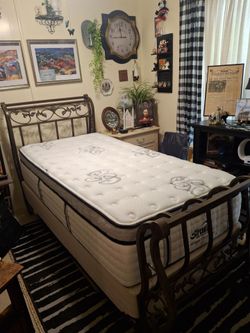 Twin bed with sleigh head and footboard