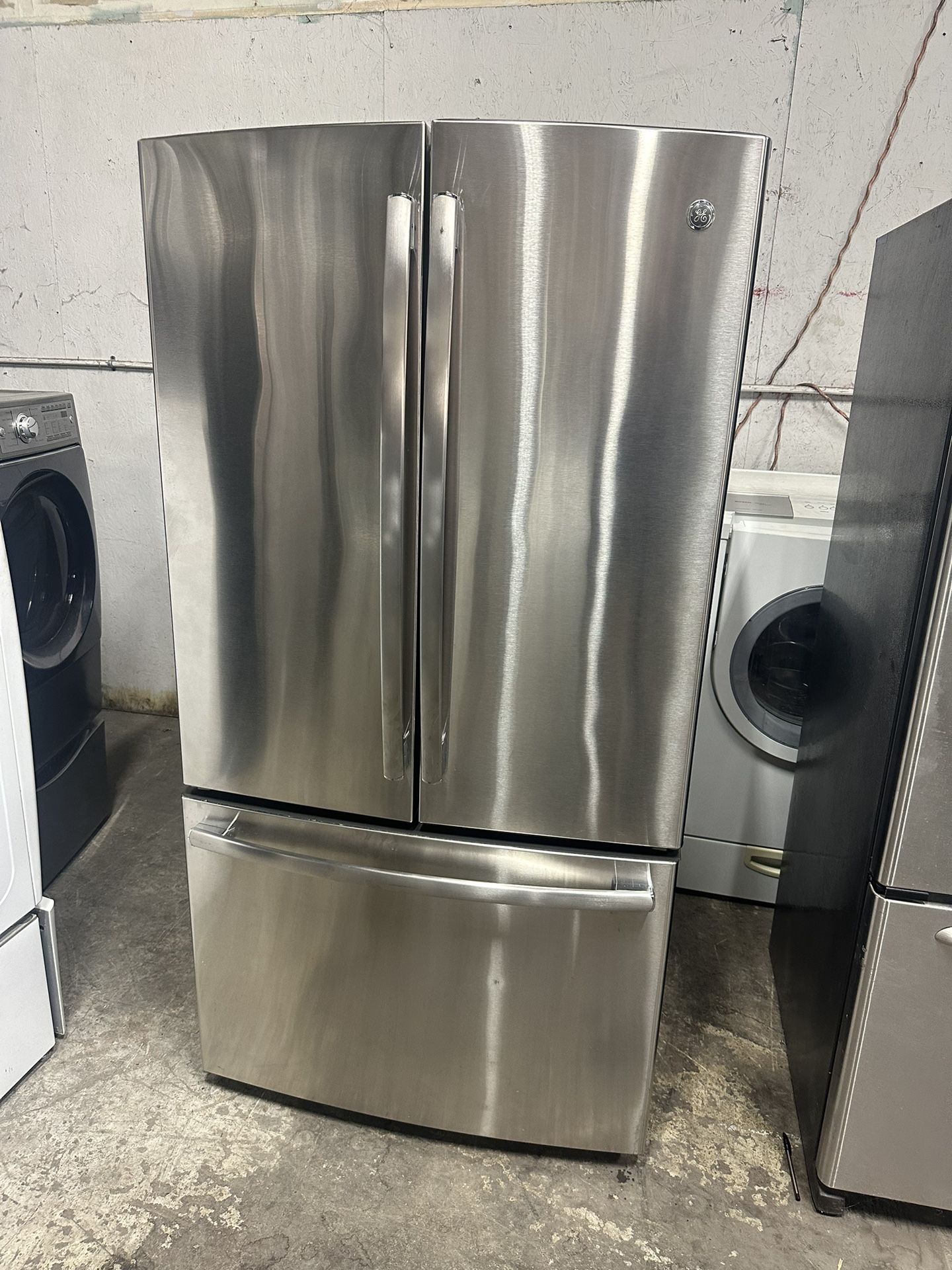 Stainless GE Frenchdoor French door with ice maker can deliver