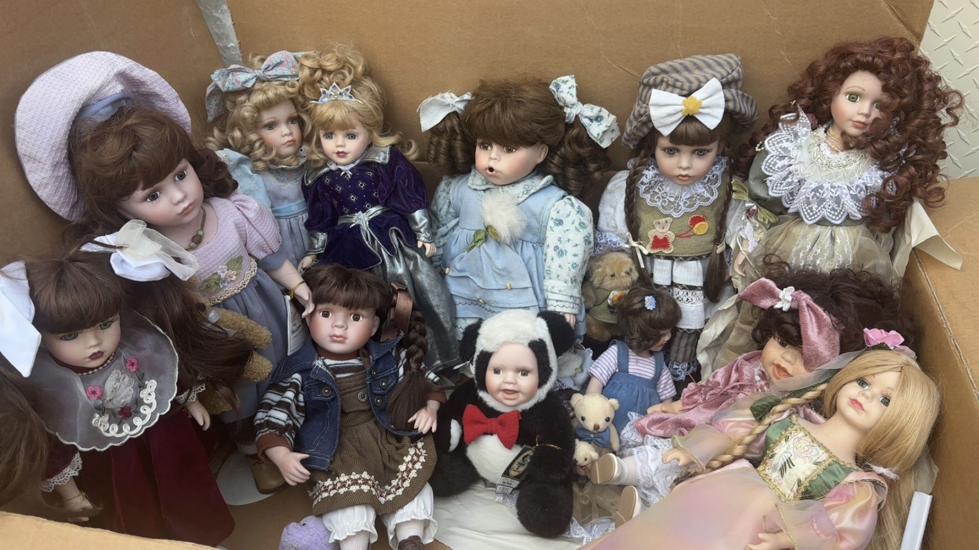 11-collectable porcelain dolls