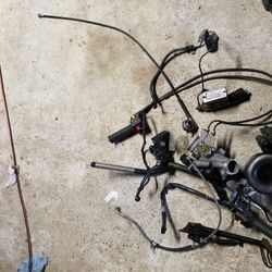 Harley Buell parts, brake calipers lines, ignition, carb, throttle, etc..