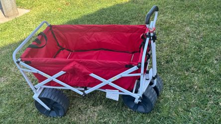 Wagon with large wheels and collapsible. Great for trips to the beach or park!
