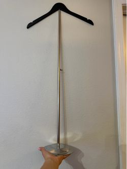 Table cap and gown holder