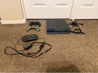 PS4 with charging station and 2 remotes