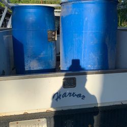 Two  blue 55 gallon drum $10 each