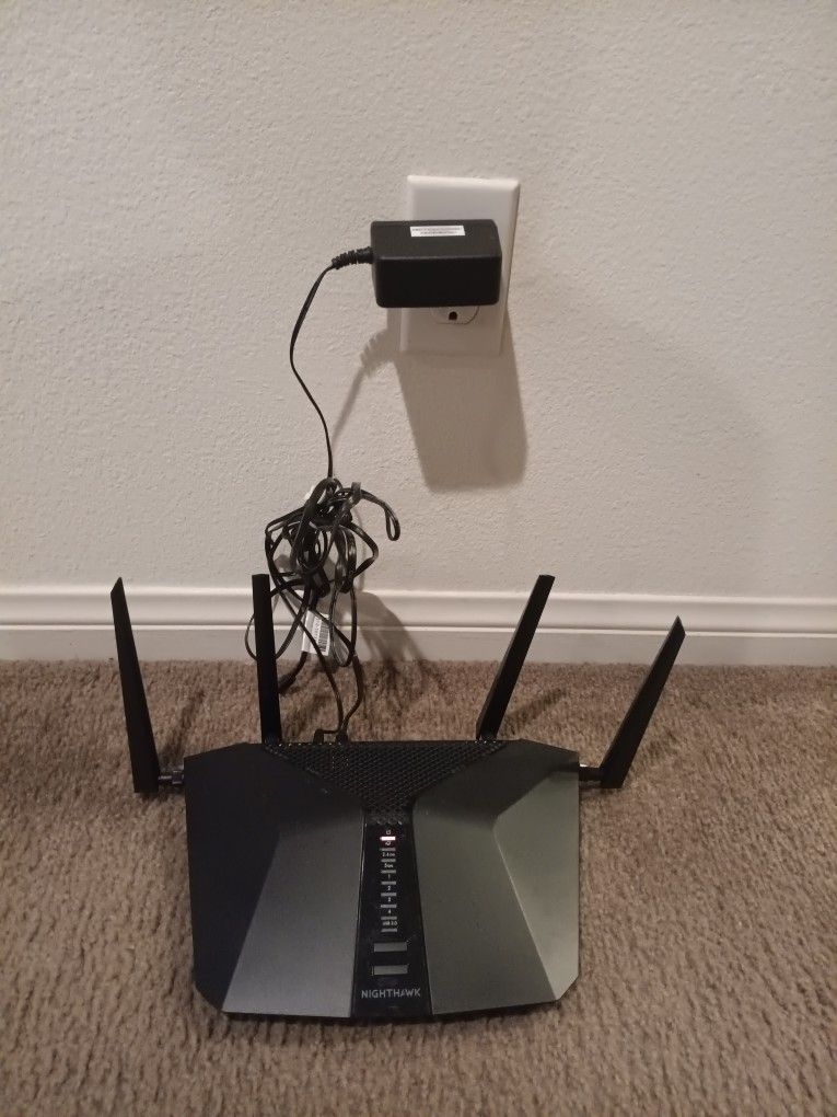 Netgear Nighthawk AX6 AX4300 6-Stream WiFi Router, Model: RAX45. 
