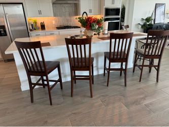 Set of 4 wooden kitchen chairs / barstools