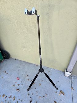 “Ultimate Support” brand collapsing bicycle repair stand