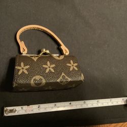 Faux leather designer look coin purse with a hinge and clicking clasp, Plainfield, Illinois