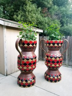 Jarrón grandes echos de llantas muy bonito para