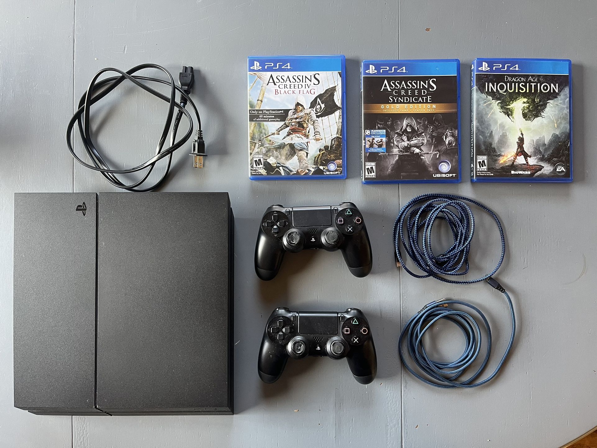 PS4 w/2 Controllers, 3 Games, and Cables