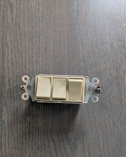 Broan Model 66V Triple Rocker Wall Switch (Ivory)