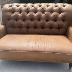 Leather Tufted Sofa $200