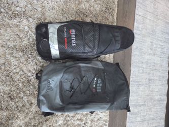 Cressi snorkeling gear and dry bags.