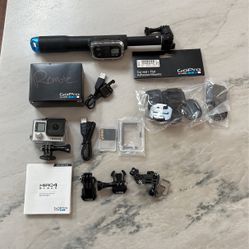 GoPro Hero 4 + GoPro Selfie Stick + GoPro Remote + All Accessories & Mounts