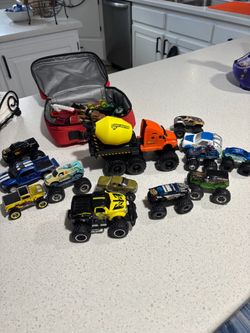 Monster trucks and cars in a Spider-Man lunchbox. All for $25.