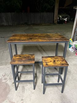 Table with bar stools