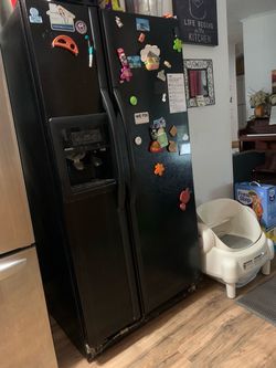 Black Side-by-Side Refrigerator with Ice Dispenser