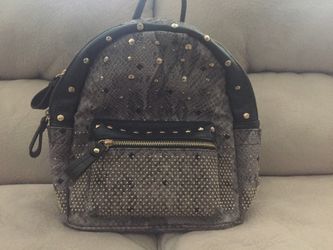 Purple and black backpack with metallic gold beads