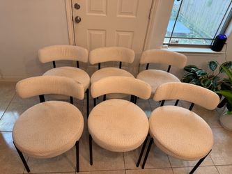 6 white dinking chairs