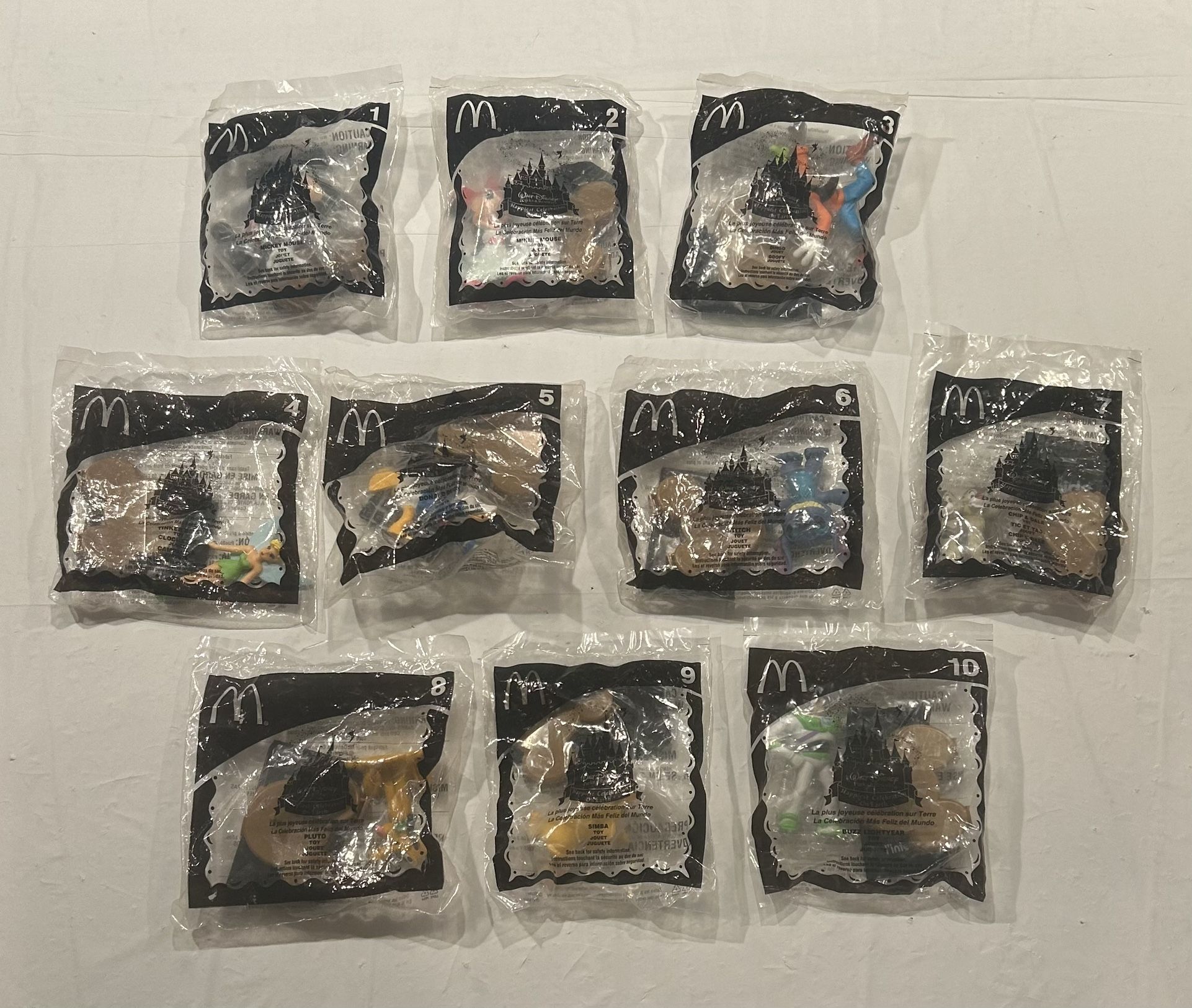 Walt Disney 2005 McDonalds Happy Meal Toys (Lot of 10) - New/Sealed   Mickey Mouse Minnie Mouse Goofy Tinker Bell Donald Duck Stitch Chip & Dale Pluto