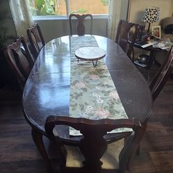 Table with 6 chairs and hutch (without the china). Smoke free home well taken care of.