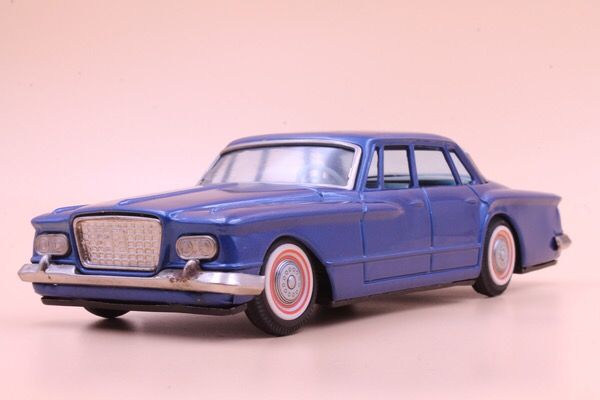 Bandai 1960 Plymouth Valiant 4-door sedan, vintage Japanese tin litho toy car