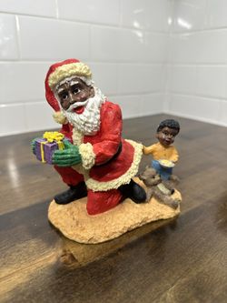 Santa Figurine With Boy And Present 