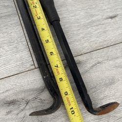 Two Black Handheld Crowbars