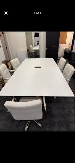 Office desk measures  6 feet x 3 feet with 6 chairs