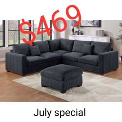Black corduroy sectional sofa with ottoman