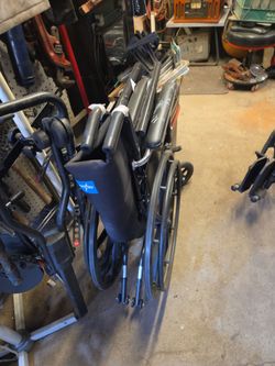 2 walkers 2 wheel chairs