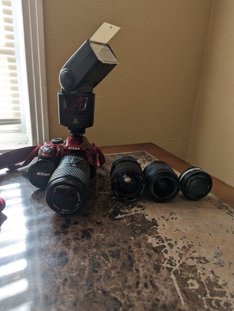 Red Nikon D3400 And Gear