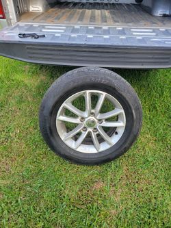 225/65R17 Tire on Silver Alloy Wheel