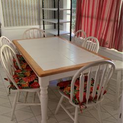 Kitchen table with six chairs, good shape with pads