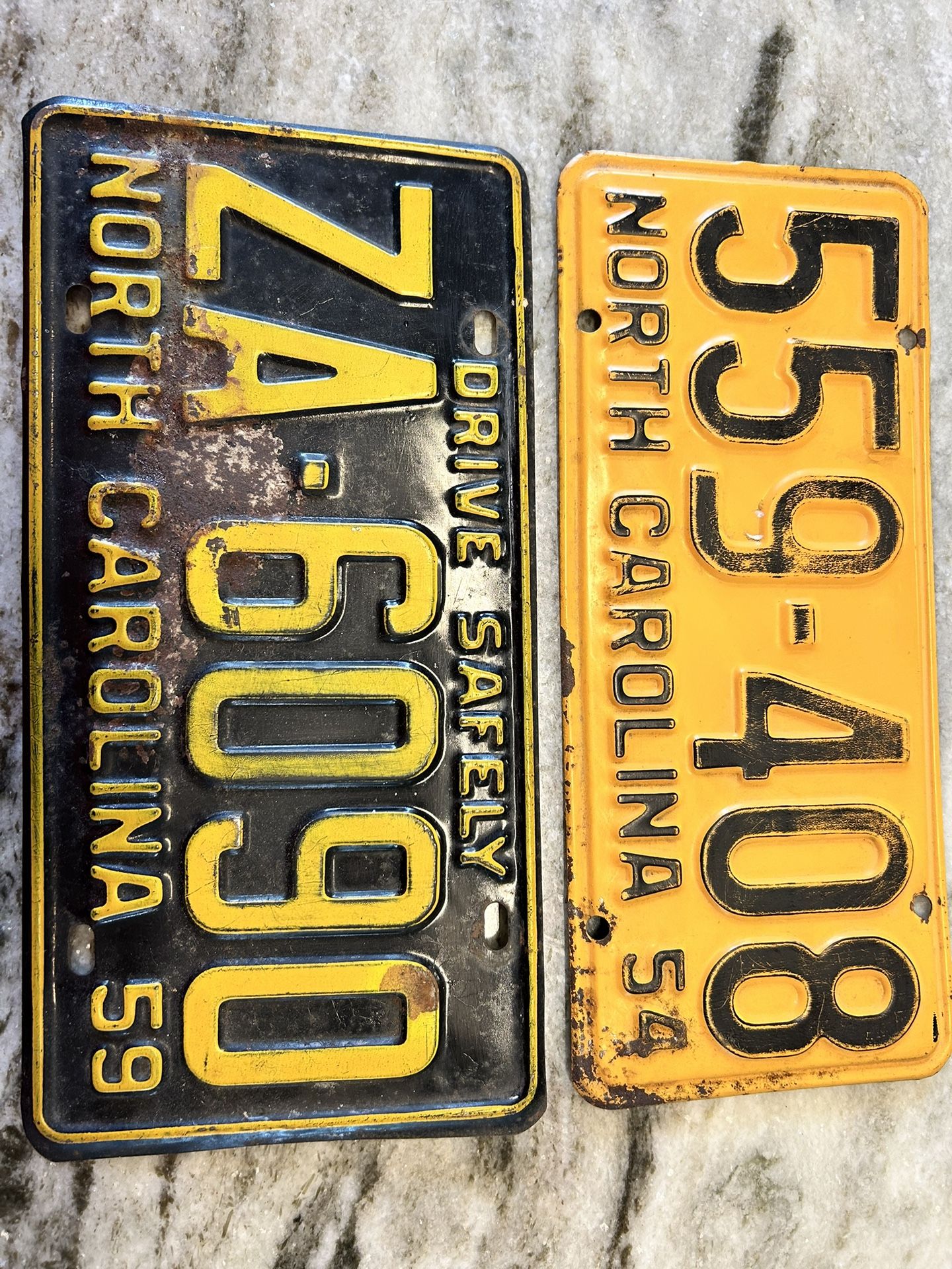 Vintage 1954 and 1959 NC license plates