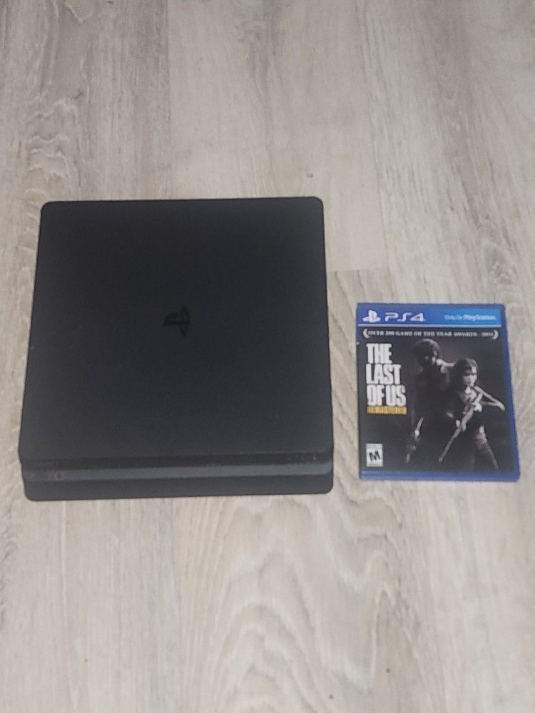 Used PS4 Slim w/ The Last of Us videogame and Keyboard