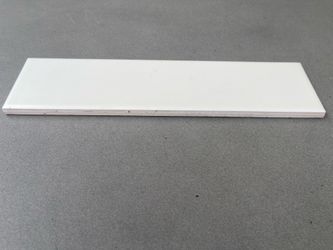 Classic white subway tile. 190 square feet of 12”x3”. Matte finish
