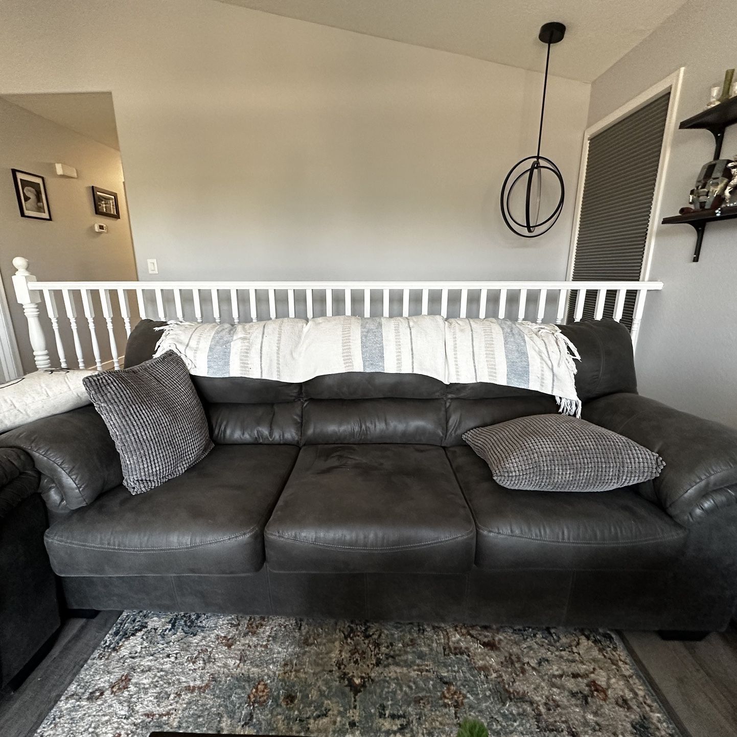 2 Gray/Green Leather Look sofas 
