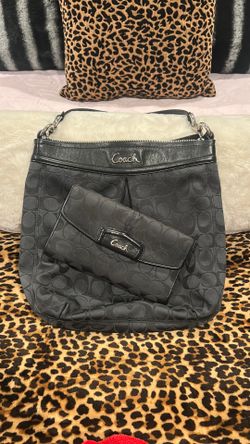 Gently used black coach purse and wallet!