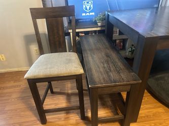 Dining room table comes with four chairs one bench in good condition. Just needs a good cleaning..250 or best offer