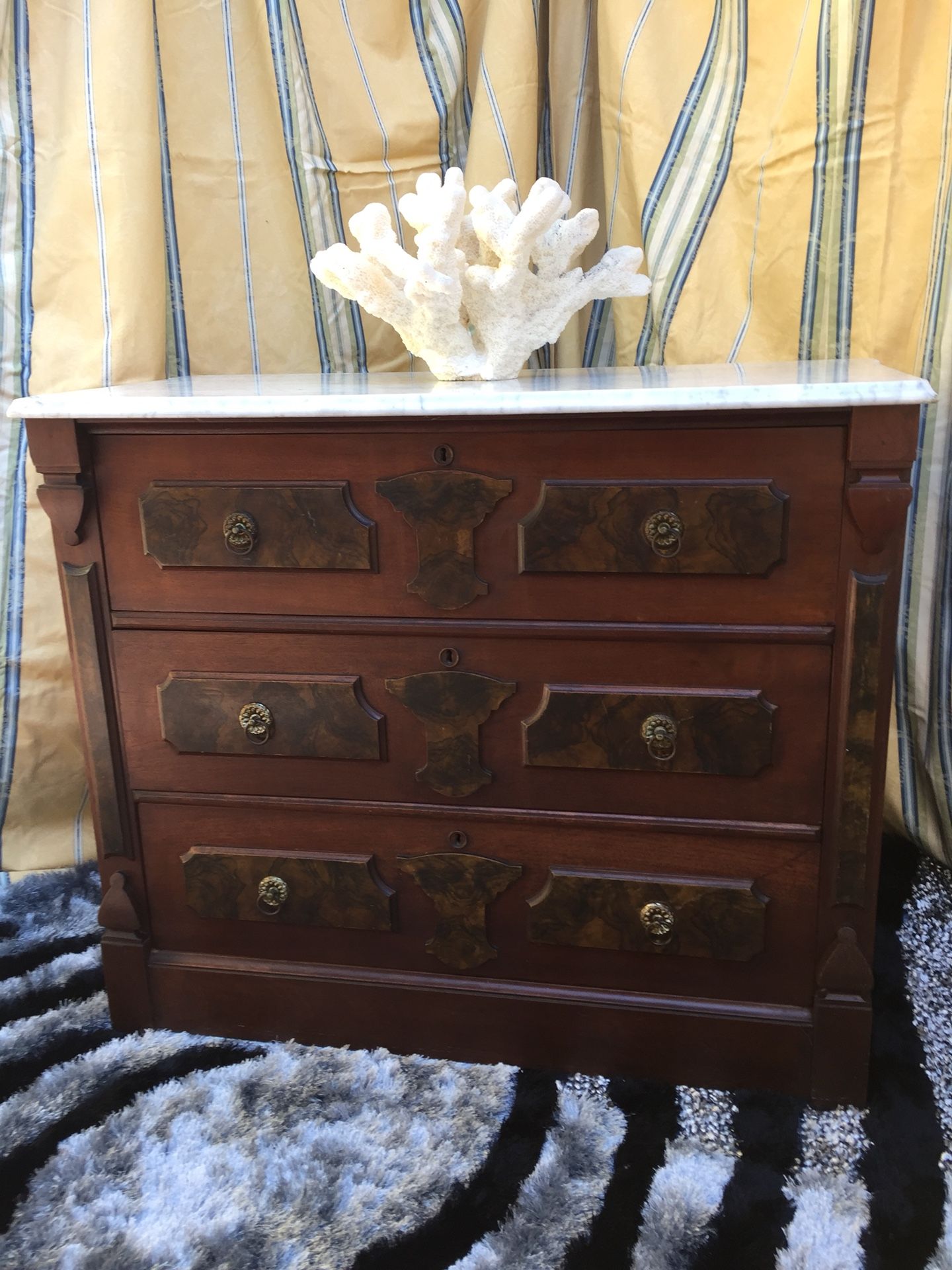 Antique dresser marble in top.